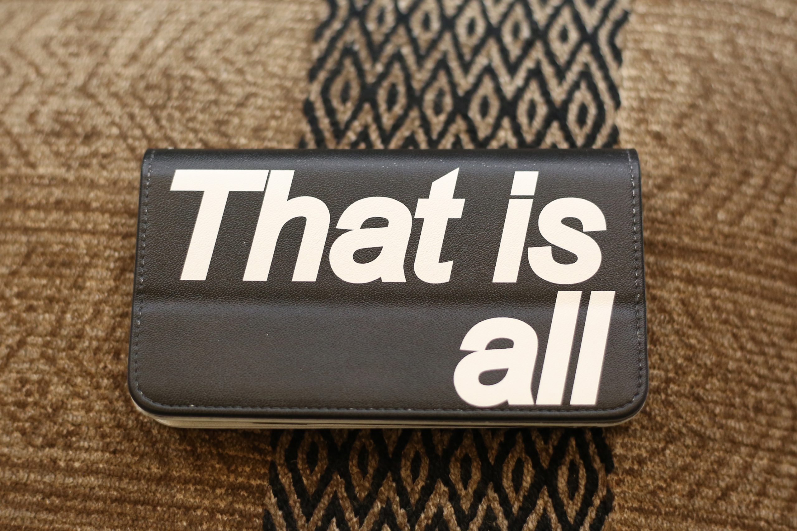 "That is all" mobile phone case produced by Aya Kajishima